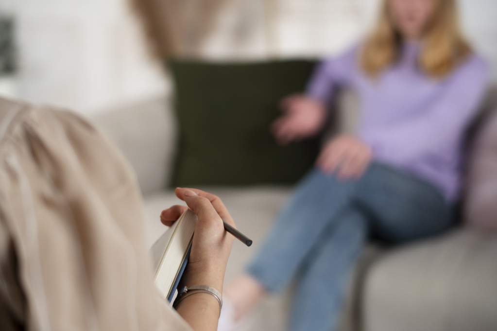 sided-view-young-girl-talking-therapist.jpg